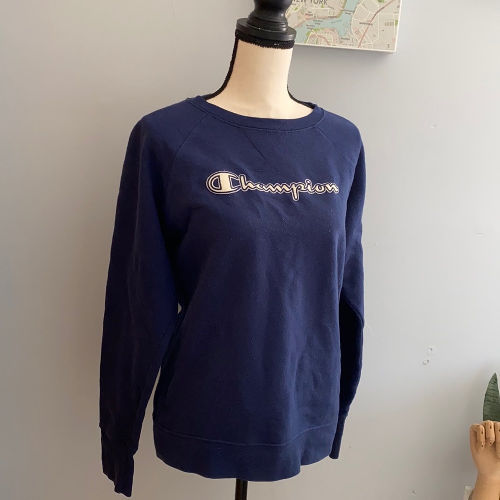 A dark blue champion crew neck